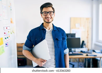 happy young man web designer 260nw 613363283